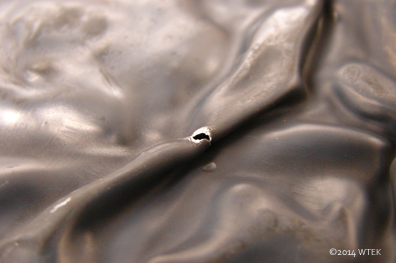 The Tear in the Fabric of Reality, ur, I mean, the hole in the nickel. ©2014 WTEK